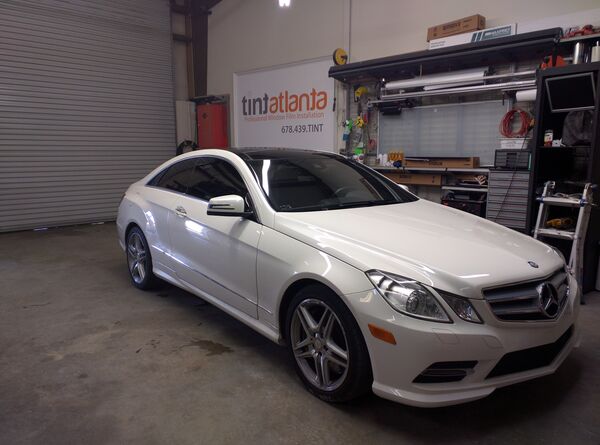 White Mercedes-Benz E-Class Coupe with professional window tinting Salt Lake City